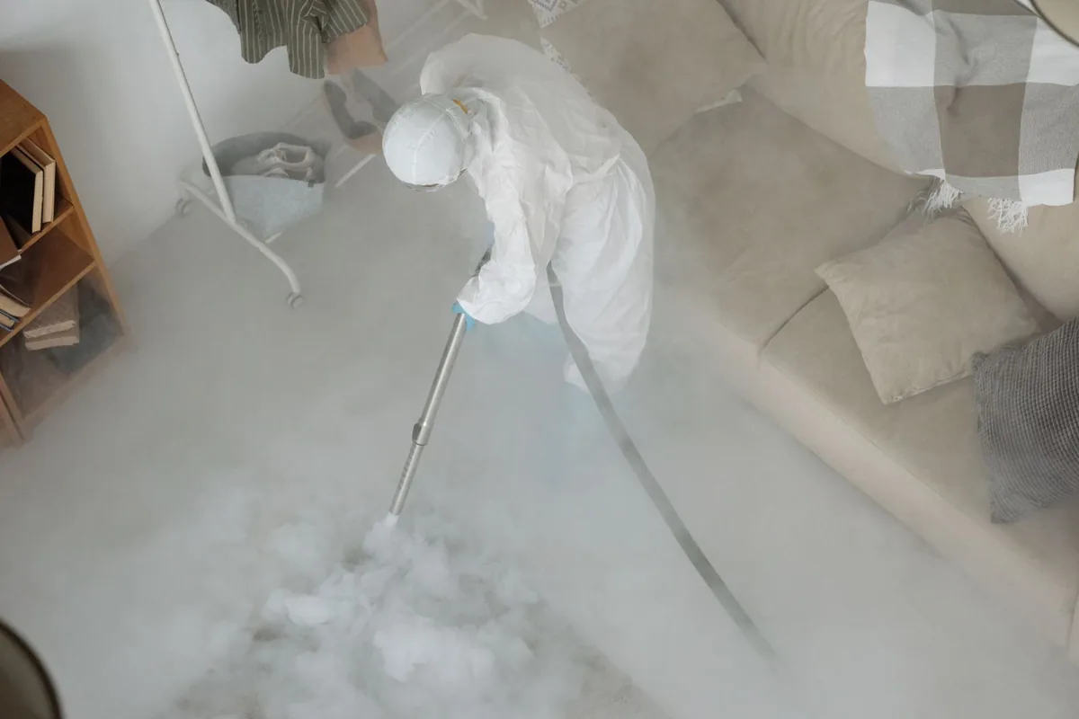 Biohazard cleanup technician in protective equipment, Manasquan, NJ